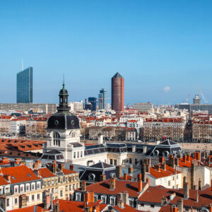 Aerial view of the roofs of the French city of Lyon with the Hotel Dieu monument and towers of the district of Part-Dieu