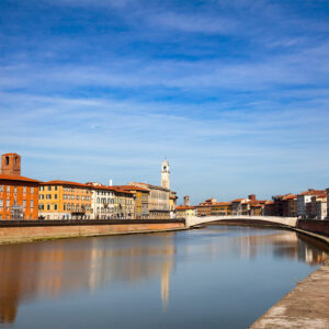 Pisa cityscape, River Arno embankment Tuscany Italy