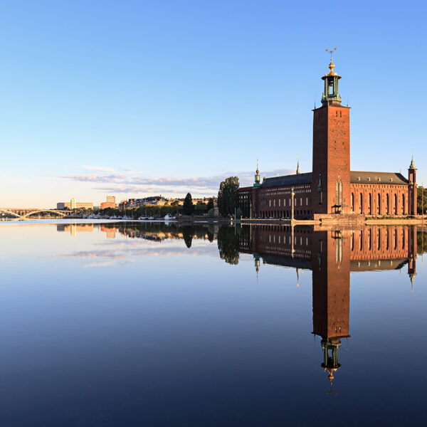 Stockholm City Hall with reflection on calm water